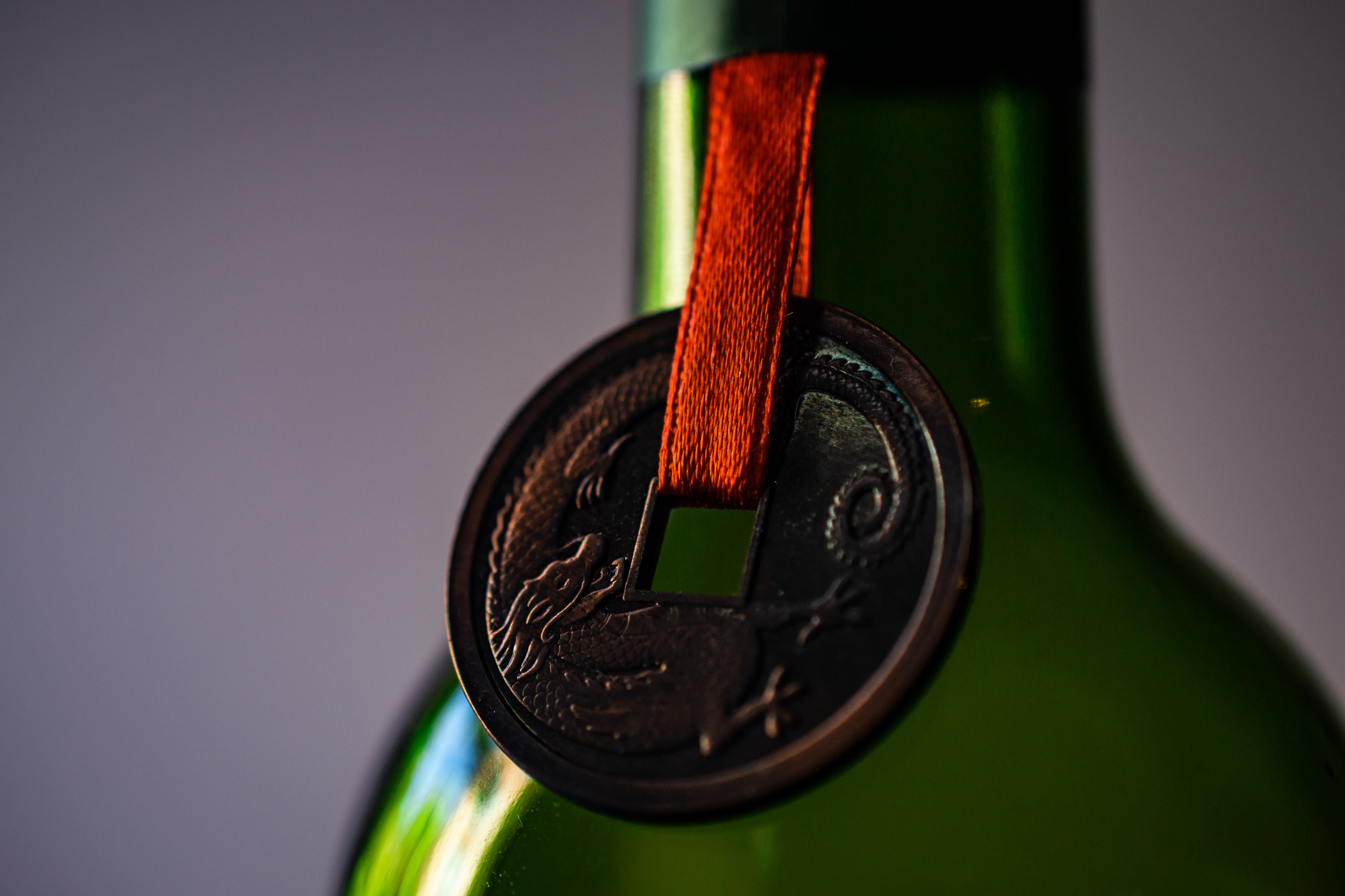 Chinese coin wine bottle